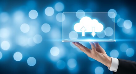 Hand holding digital tablet with cloud data upload download icon display