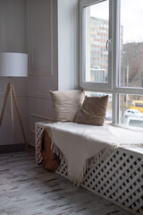Soft cushions on the windowsill