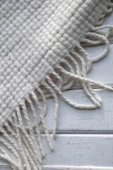 Soft white blanket on furniture