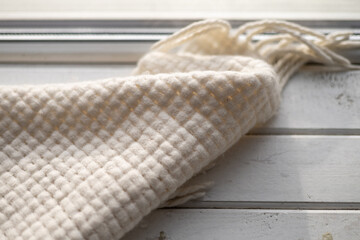 Soft white blanket on furniture