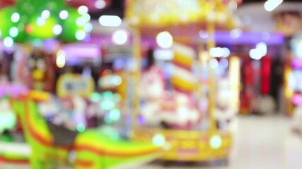 Blurred Colorful arcade zone with vibrant blurred lights and playful ambience in shopping mall, Indoor Playground, Game Zone, Kids Playpark, creating a lively and energetic entertainment atmosphere