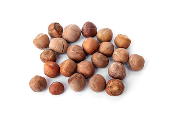 ile of fresh mini hazelnuts in shell unroasted food for pets, birds and rodents guinea pigs, hamsters, squirrels, or any grain-eating pet  isolated on white background.
