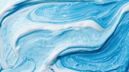 Macro view of blue and white liquid blending. Concept of moisturizing cream, acrylic art or fresh hygiene background.
