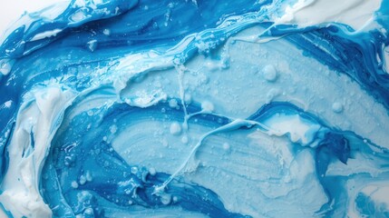 Macro view of blue and white liquid blending. Concept of moisturizing cream, acrylic art or fresh hygiene background.