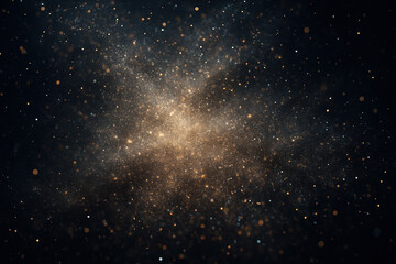 Abstract golden glitter particles on a dark background, perfect for design