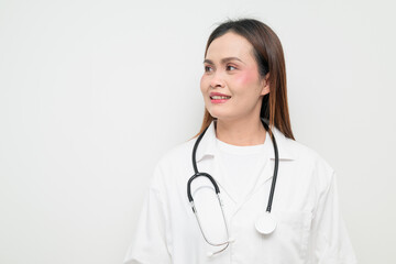 Fototapeta premium Female doctor with stethoscope thinking