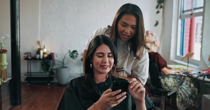 Woman, hairdresser and client at salon, phone or talk with picture, online inspiration or service at small business. People, smartphone and customer experience with app, grooming or hairstyle at shop