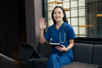 Asian medical professional having telehealth video call