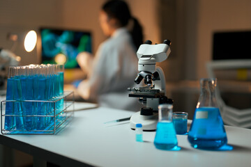 Scientific research with microscopes, test tubes and lab equipment