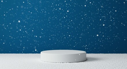 Minimalist white podium or pedestal on a snowy surface against a deep blue background with falling snow