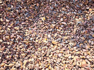 Colorful gravel texture with diverse stone shapes suitable for landscaping and construction projects