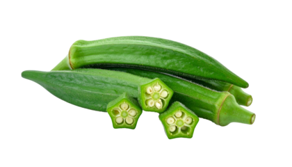 Close-up of several whole and sliced vibrant green okra pods, isolated on black