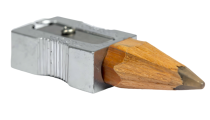 A close-up view of a metal pencil sharpener with a wooden pencil inserted, ready to be sharpened
