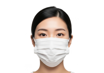 Young asian woman wearing a white disposable medical face mask looking directly at camera for health protection