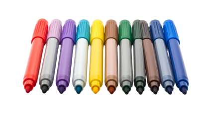 Close-up of a row of colorful markers with various shades laid out against black