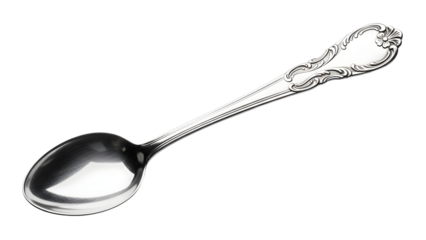 Antique ornate silver spoon with detailed handle on  white background