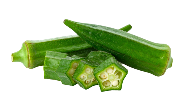 Close-up studio shot of a grouping of green, fresh, raw, okra pods; some sliced