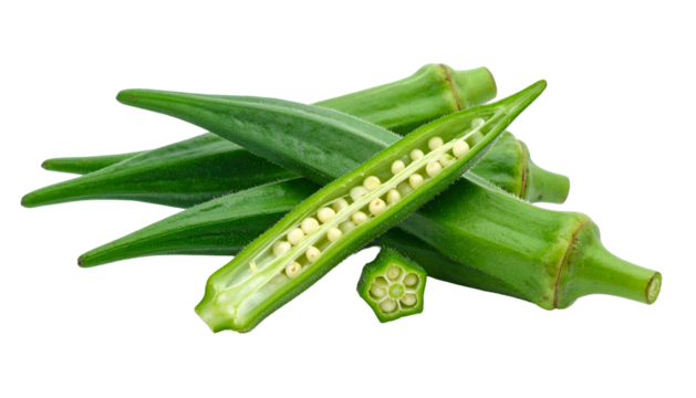 Close-up of sliced and whole green okra with visible seeds on a black background