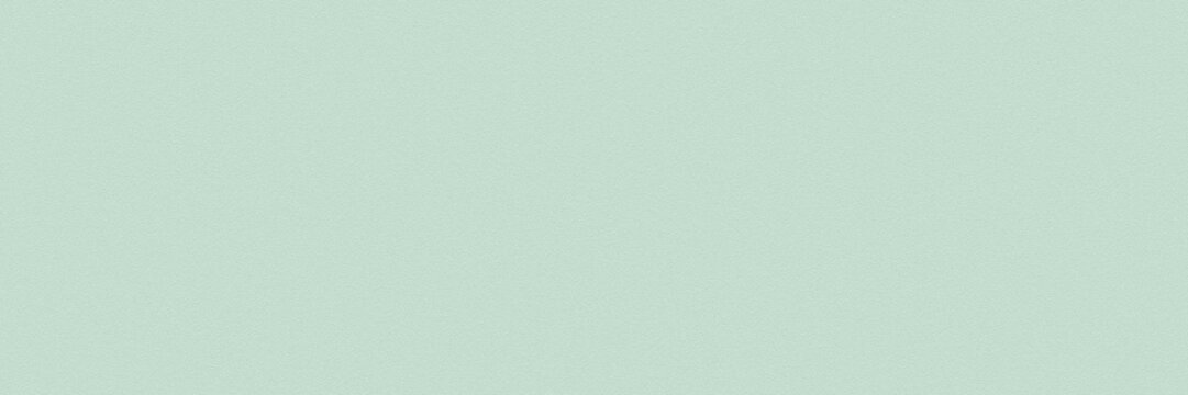 Soft Mint Green Textured Background with Subtle Paper Grain Surface