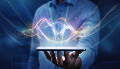 Digital wave visualization emerging from smartphone screen in hand