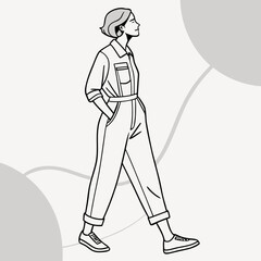 Stylish woman in a jumpsuit walking confidently