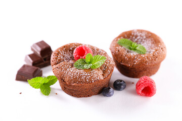 delicious chocolate cake with fresh berries isolated on white background