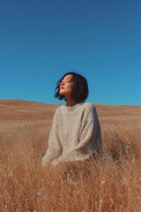 A serene moment of mindfulness in an open field, promoting tranquility and introspection amid nature's beauty.