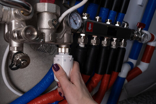 Complex residential heating manifold system with valves, gauges, and piping network