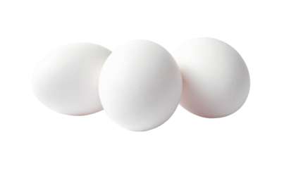 Three clean, white eggs are arranged close together. They are isolated against a stark black background