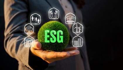 Focus on sustainability and responsible practices with ESG symbols represented through a hand holding a green globe