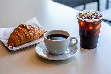 Croissant and coffee drinks on a table, breakfast and refreshment concept
