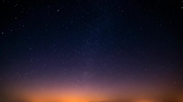 A celestial gradient depicts a twilight sky merging from fiery orange to vibrant purple, studded with a multitude of stars