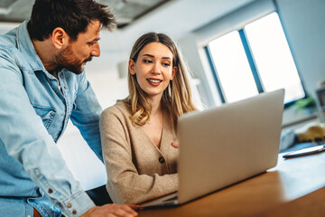 Portrait of success business people working together in home office. Couple teamwork startup concept