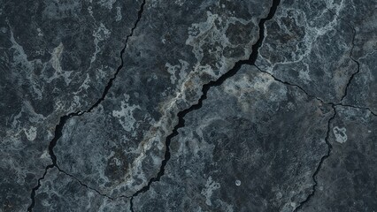 Obraz premium Cracked and weathered surface with dark lines and textures.