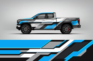Fototapeta premium Blue and white pickup wrap with futuristic block-style patterns for a clean, fast, and high-tech offroad look. Includes editable EPS.