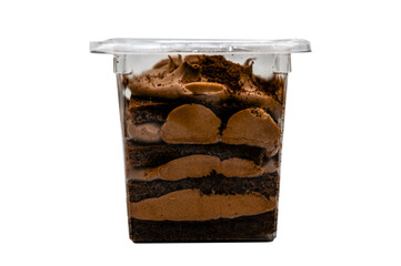 Sweet tasty dessert in a plastic container on a white background.