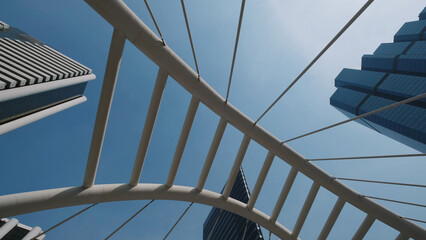 Obraz premium Walkway bridge arch and skyscrapers in Bangkok