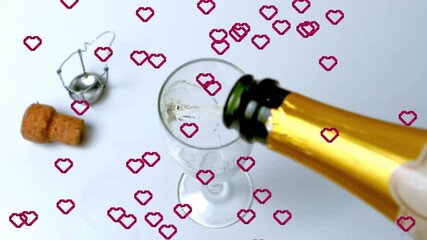 After cork popping, champagne bottle neck pouring into glass, hearts appearing, celebrating toast - Powered by Adobe
