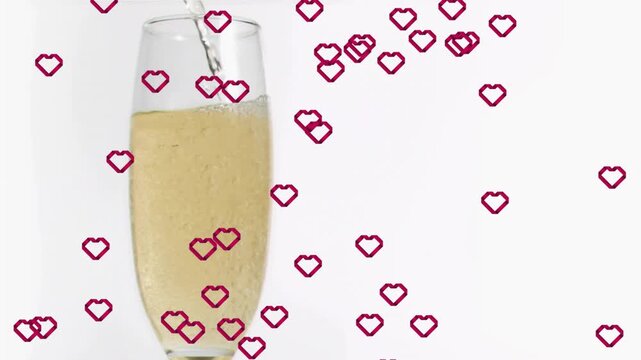 Off-frame stream pouring into flute raising level bubbling filling with magenta hearts celebrating