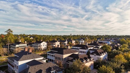 Aerial view of large mansion houses with swimming pool,  in affluent neighborhood  by Woodlands lake, Houston, Texas, expensive suburban homes surrounding by lush green trees, USA