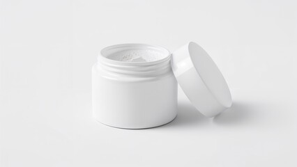 A white container with a lid, possibly a cosmetic or skincare product, with a plain white background.