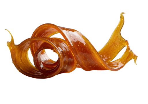 A gourmet, glossy amber caramel ribbon artfully coiled with sparkling sea salt on a pristine off-white ceramic plate, isolated against a transparent background, commercial food concept