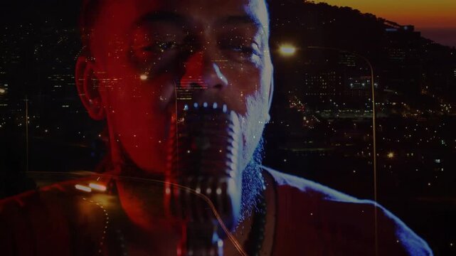Male singer recording music into vintage mic while camera revealing face and city light overlays