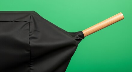 Black Cover with Wooden Handle on Green Screen for Advertising