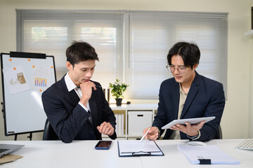 Asian business people in meeting