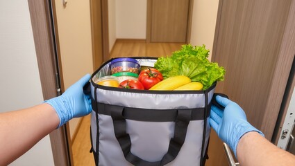 Courier delivering groceries from supermarket in a thermal bag, emphasizing safe, fast, and hygienic food delivery services for home and urban customers