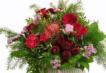 Blumenstrauß in Rottönen