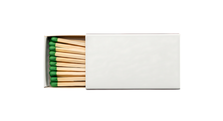 A box of matches with green heads lies open against a white background.