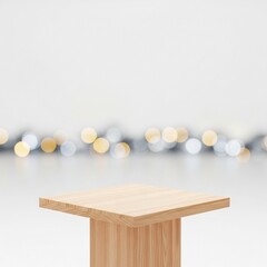 Elegant empty light wooden table top serving as a product display podium with a shimmering, blurred gold and white bokeh background