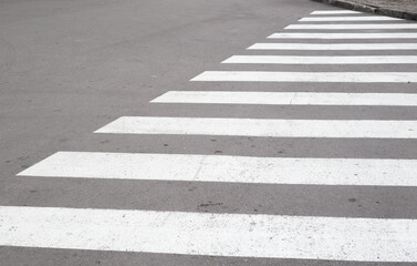 crosswalk zebra gray road urban minimalistic abstract background. white crosswalk pattern texture background asphalt road city sidewalk intersection